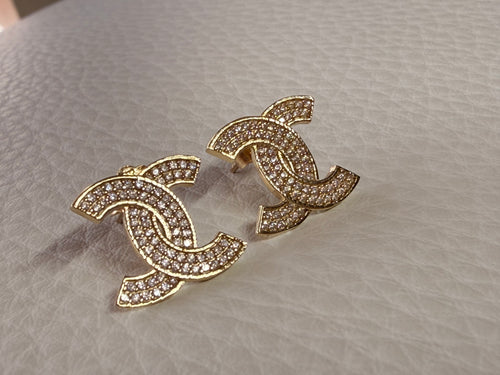 ARETES CHANEL 10k.                        $180