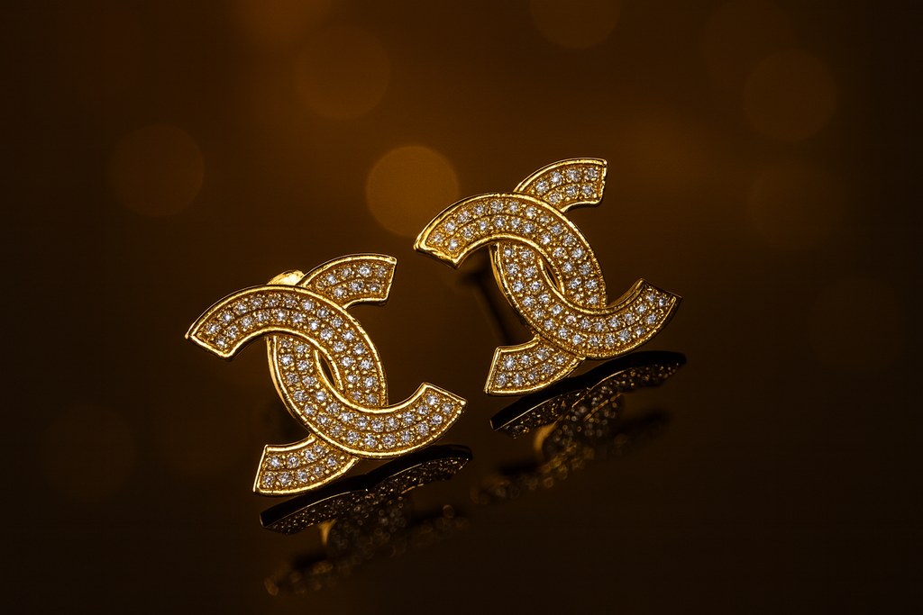 ARETES CHANEL 10k.                        $180