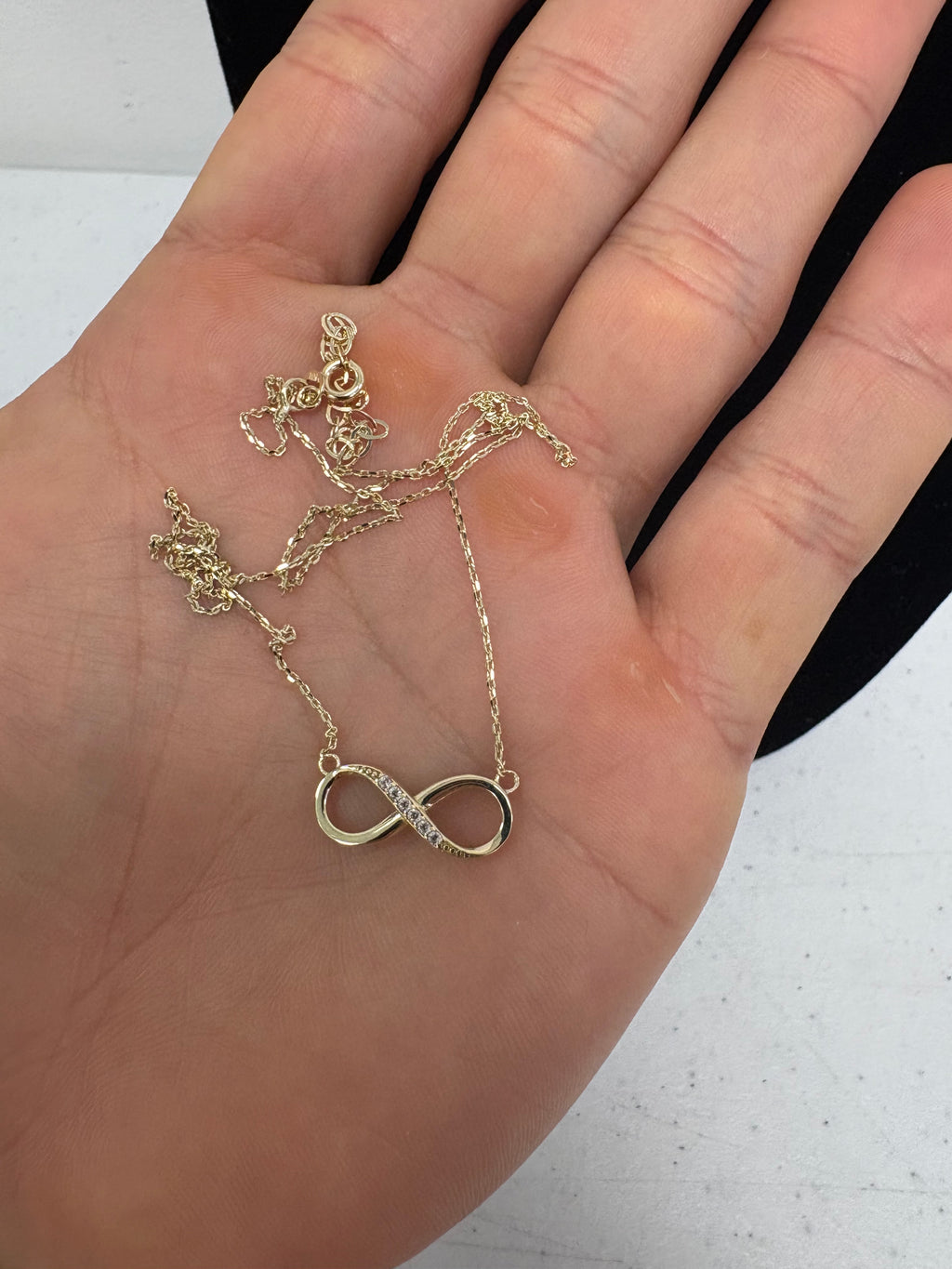 CADENA CON SIGNO DE INFINITO 10K $219.99